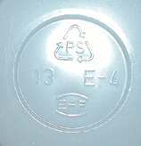 Recycling symbol on a plastic yoghurt tub.